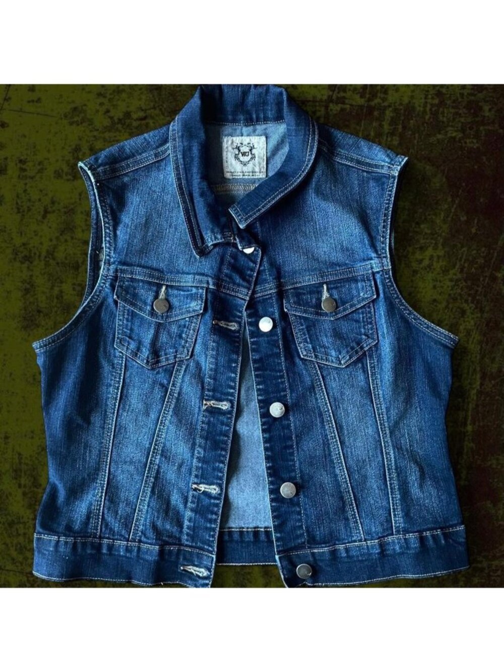 Blue denim vest with button-up front and pockets #denimvest